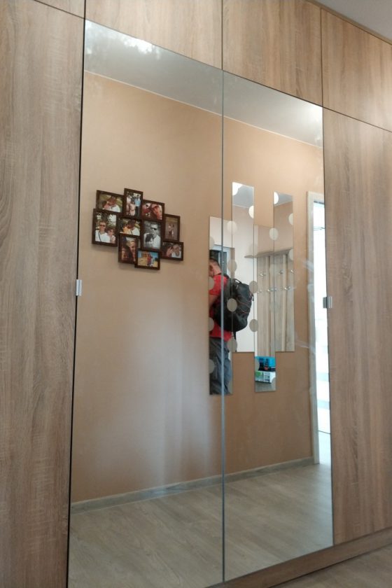 Szafy na wymiar z drzwiami uchylnymi - Porta Meble